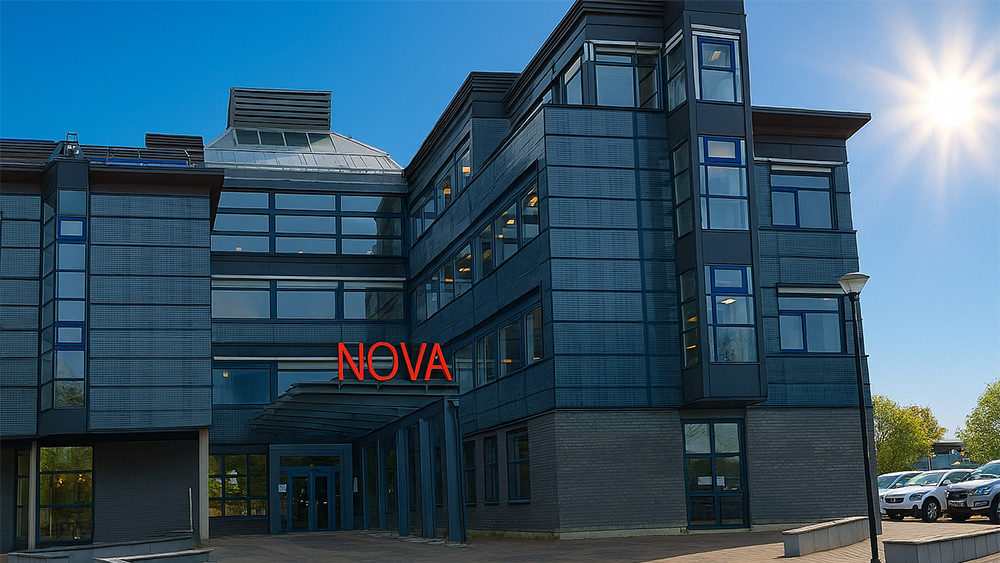 Exterior view of Magna Electronics building in Linkoping, Sweden with the sun shining in the background
