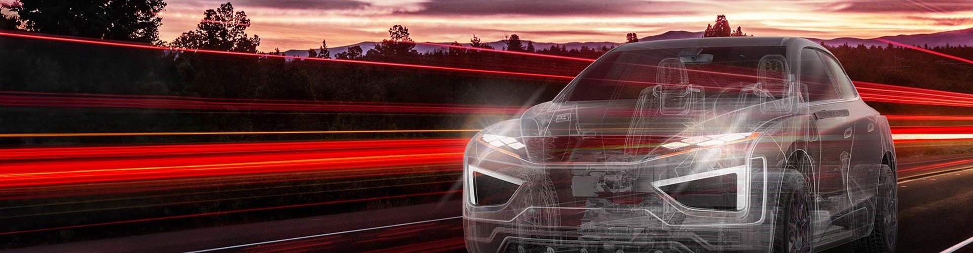 Smiling woman in a red shirt engaging in a group discussion in a modern office