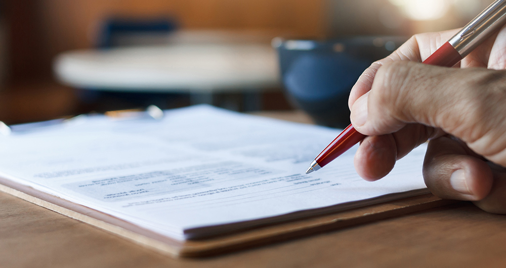 Person signing a document